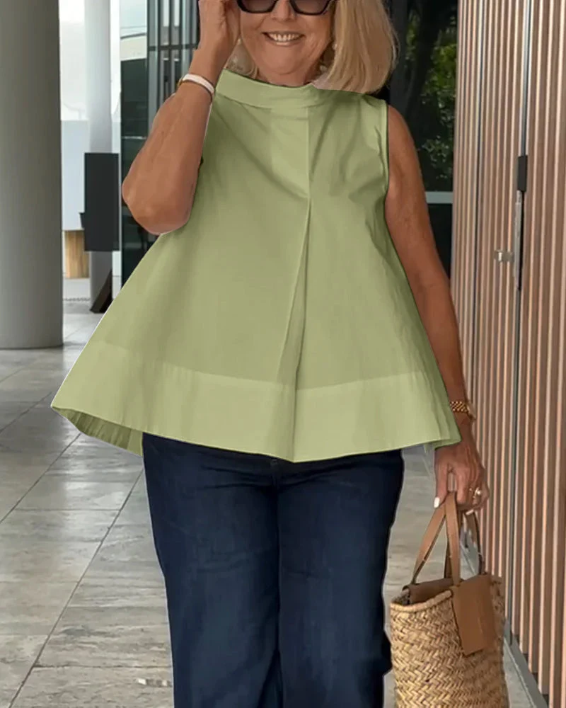 Sana – Blusa lisa sin mangas de estilo minimalista y chic - Imagen 9