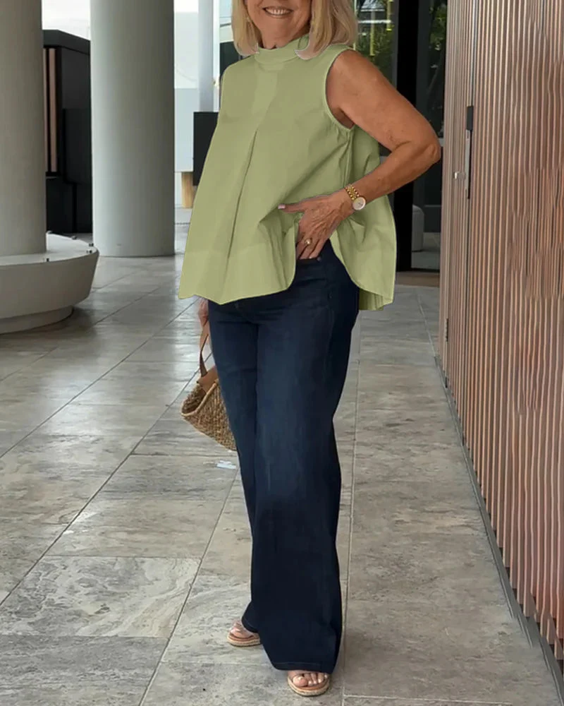 Sana – Blusa lisa sin mangas de estilo minimalista y chic - Imagen 7