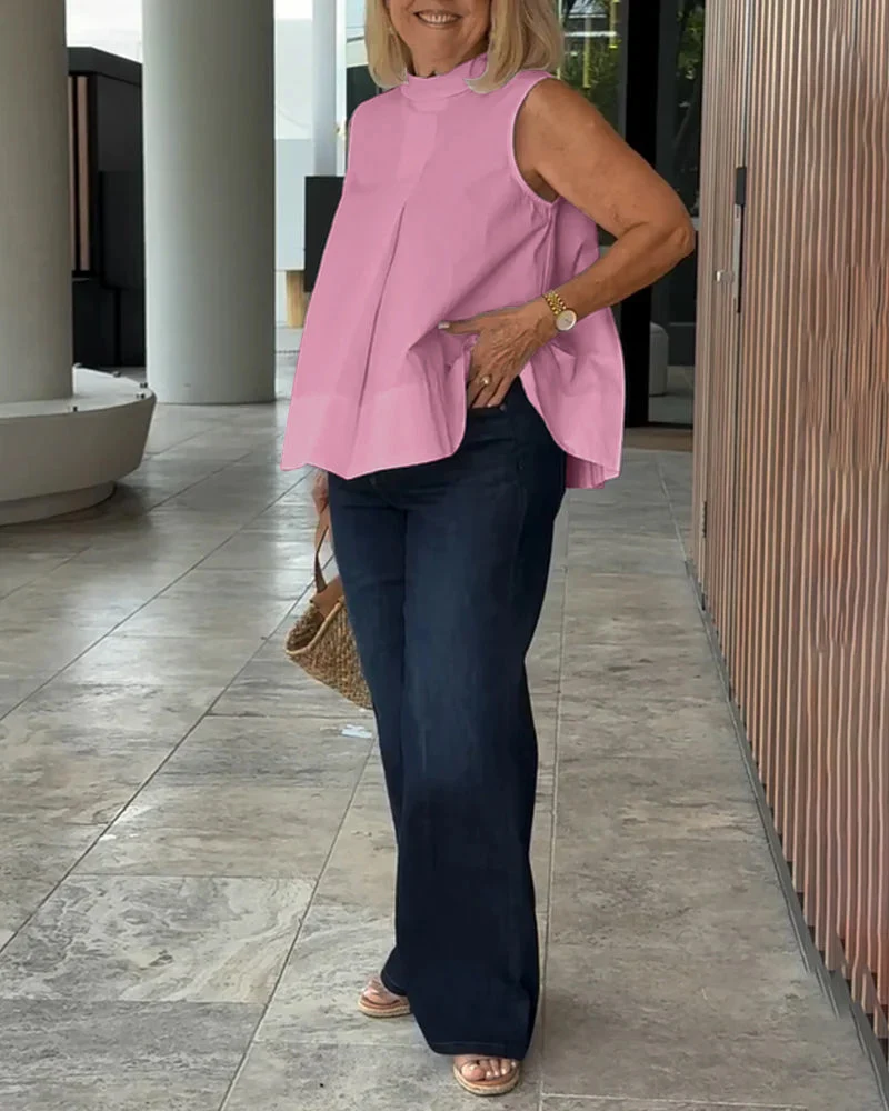 Sana – Blusa lisa sin mangas de estilo minimalista y chic - Imagen 5