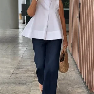 Sana – Blusa lisa sin mangas de estilo minimalista y chic