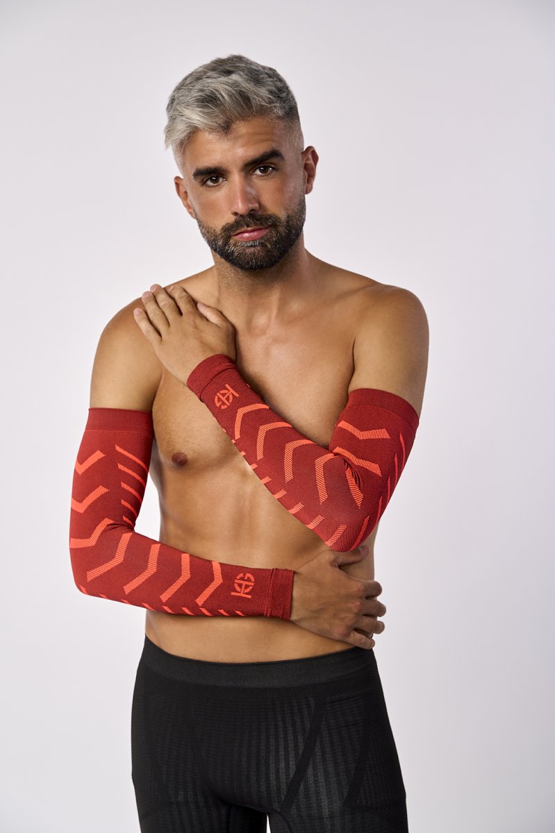 BONE · Manguitos técnicos con fibra de carbono para deporte | Naranja - Imagen 2