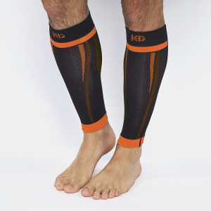 DUNE · Perneras técnicas compresivas para outdoor y entrenamiento | Naranja